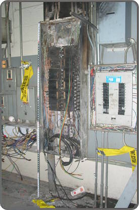 Remains of a 480-volt circuit breaker panel